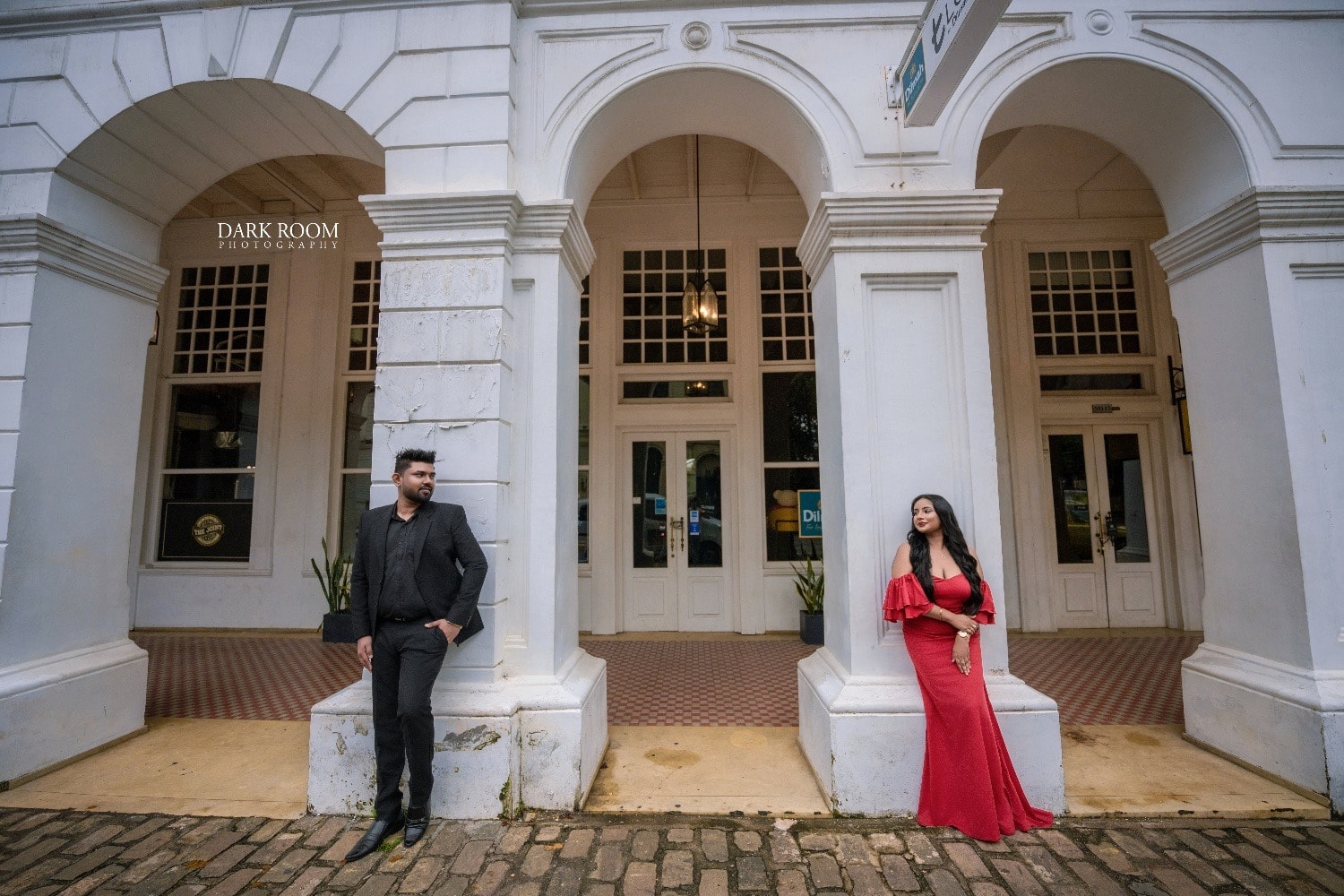 Ashan and Oshini among white colonial arches
